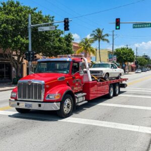 Tow truck assisting a vehicle on a Homestead, FL street, illustrating local towing services